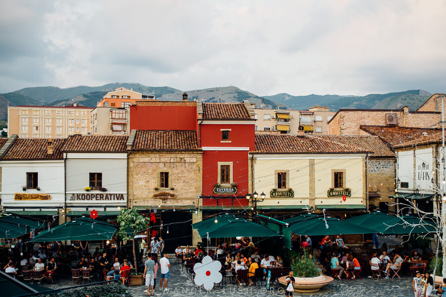 Korca Old Bazaar – colourful facades repurposed as cafes.