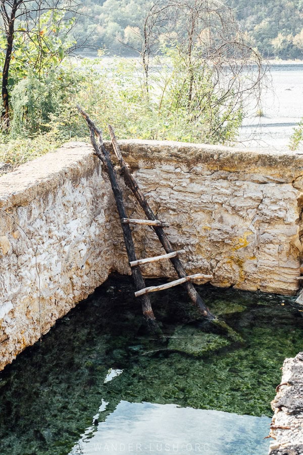 A stone bathtub at the Sarandaporo Thermal Springs in Albania.