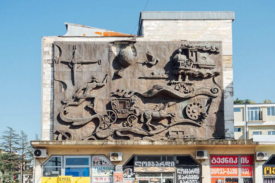 A large frieze decorates a building in downtown Zugdidi.