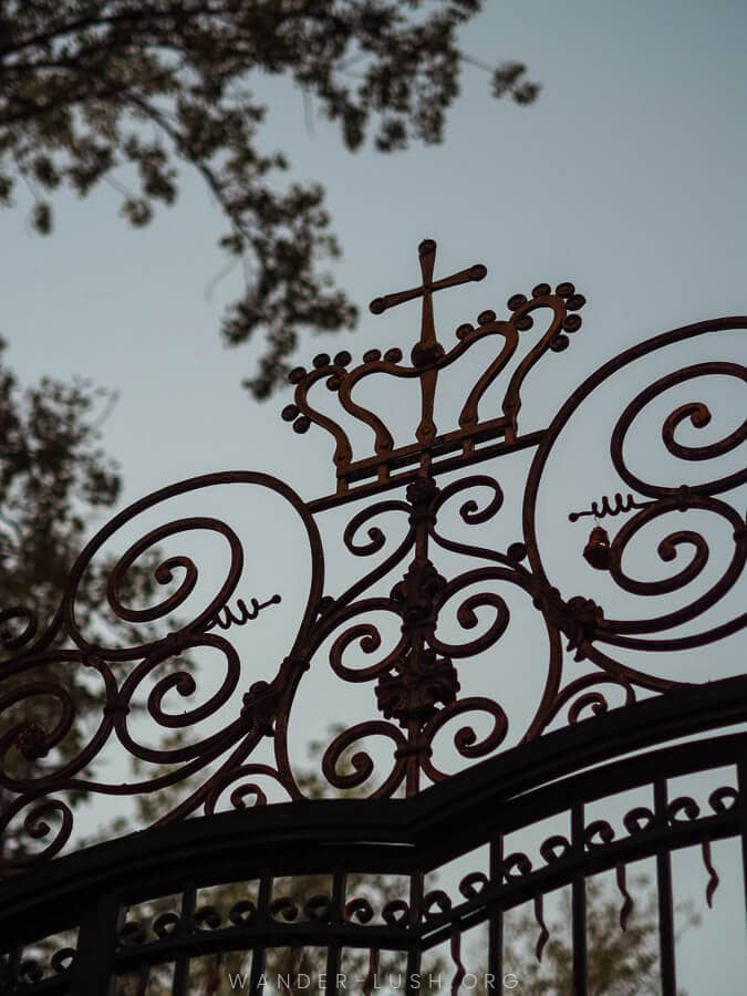 An elaborate metal gate at the front of Dadiani Palace in Zugdidi, Georgia.