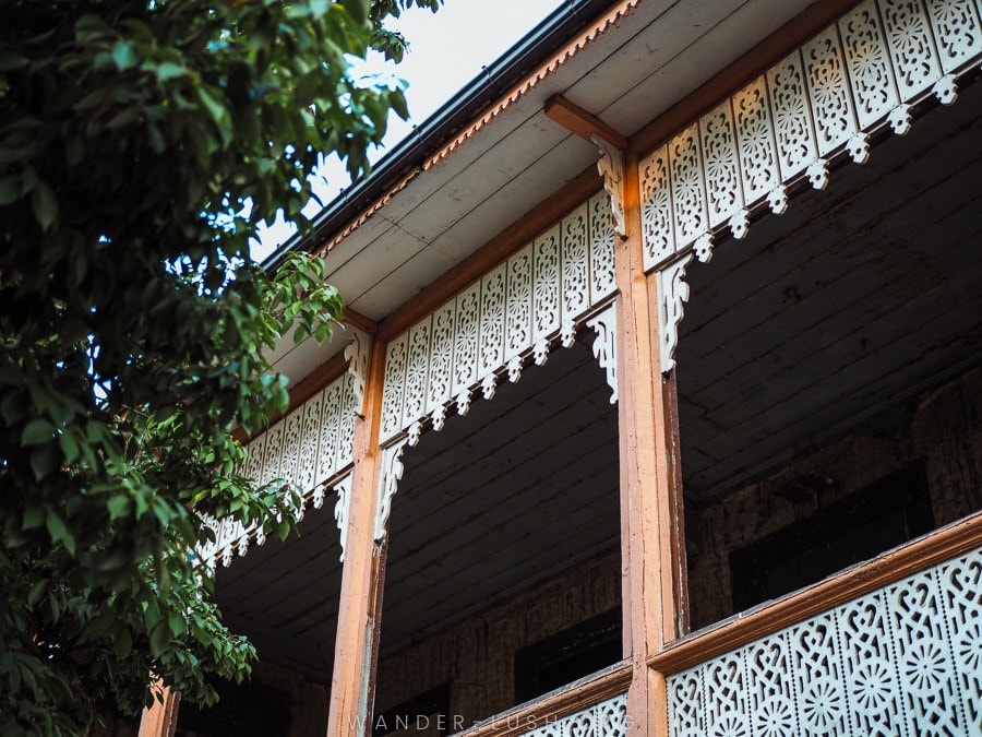 A wooden balcony on a traditional Oda house in Zugdidi.