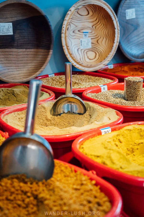 Buckets of adjika and other Georgian spices for sale at a shop in Zugdidi.