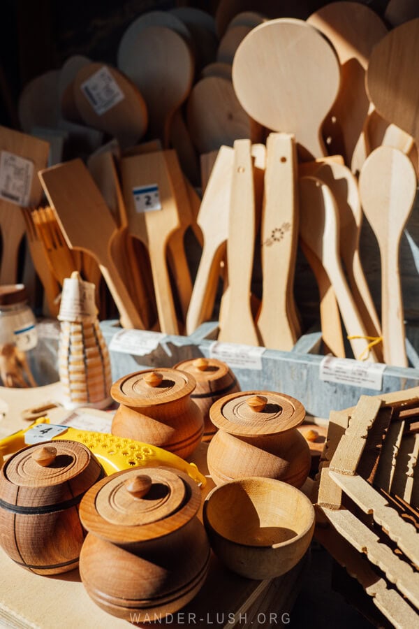 Carved wooden containers and spoons for sale at a souvenir shop in Zugdidi.