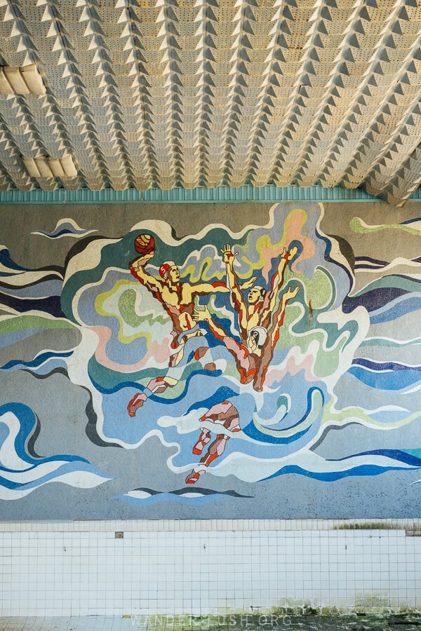 A Soviet mosaic depicting waterpolo players inside an abandoned sports complex in Zugdidi.