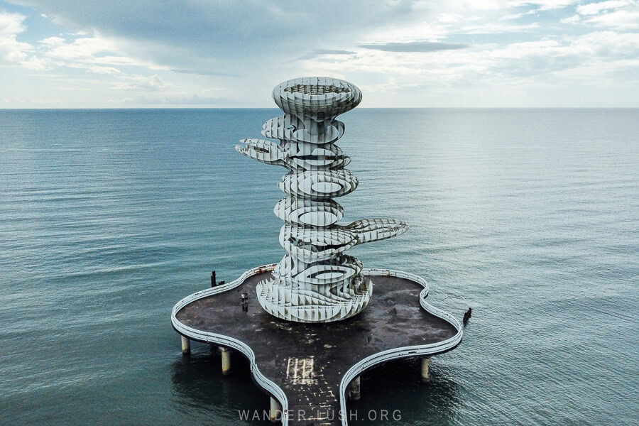 A sculptural tower on a platform in the Black Sea in the resort city of Anaklia.