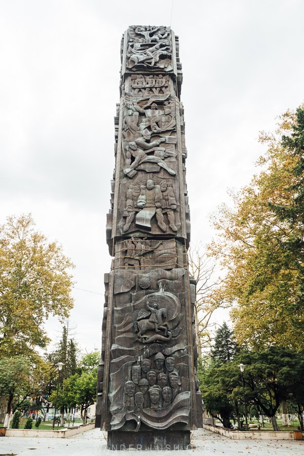 A Soviet-era monument in the town of Abasha, Georgia, covered with friezes of soldiers and different motifs.