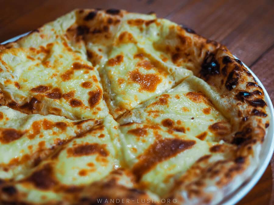 Royal khachapuri, a traditional cheese bread dish served at restaurants in Zugdidi.