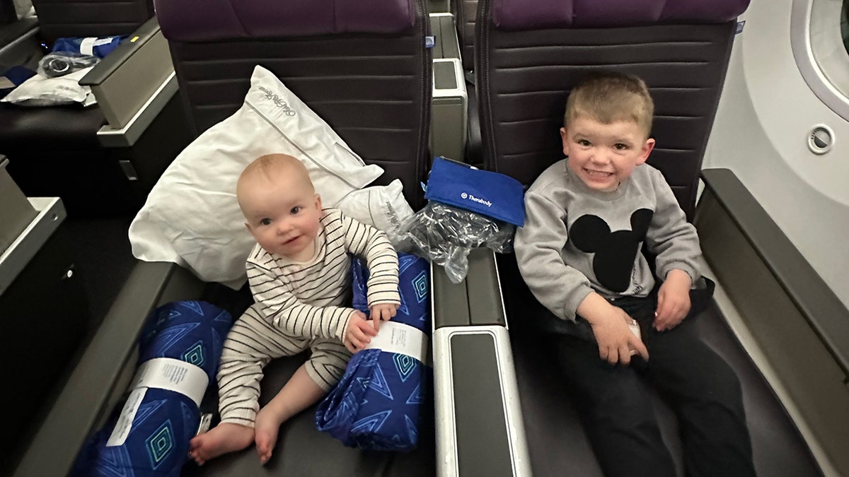 Briggs and his younger brother flying on plane