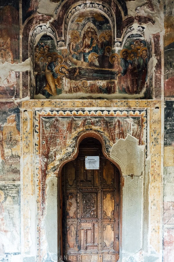 The intricately carved wooden door to the chuch in Leus village, Albania.