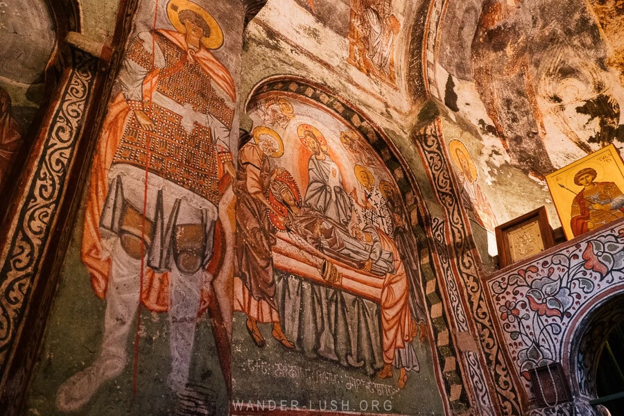 Vivid frescoes inside Laghami Church in Mestia, Georgia.