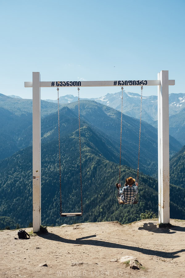 A man on the flying swing over Mestia.