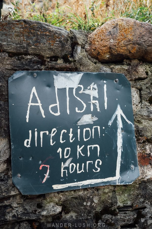 A sign pointing the way to Adishi Village in Georgia.