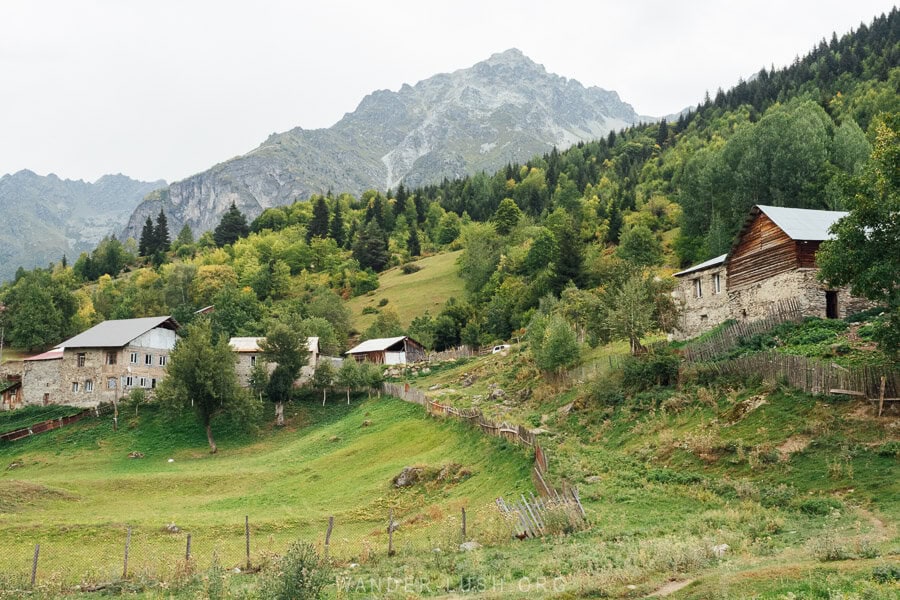 Green hills and cottages in Zhabeshi, Svaneti.