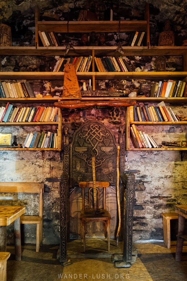 Woodwork and an old bookcase inside a traditional restaurant in Svaneti, Georgia.