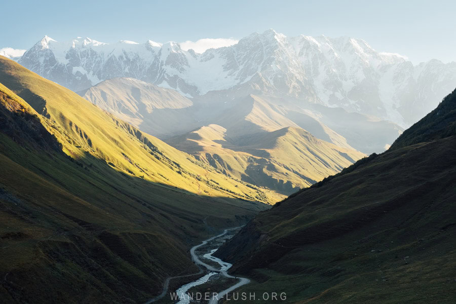 Sunrise over the Enguri River Valley and Mount Shchara in Ushguli, Georgia.