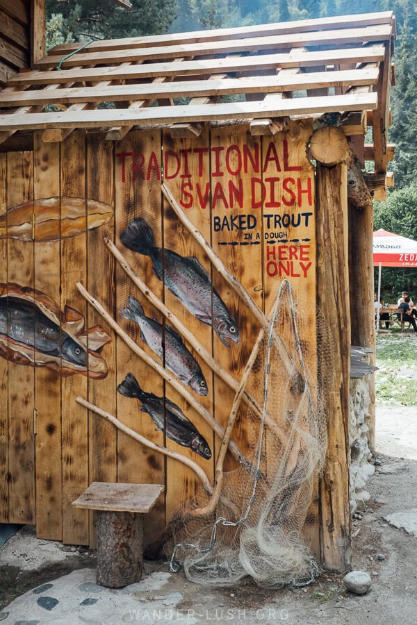 A wooden outdoor kitchen at Hikers Inn in Mazeri.