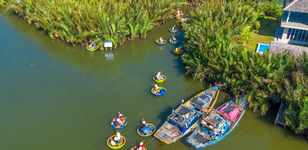 erial view of a coconut basket boat tour in Cam Thanh village, Hoi An, Vietnam.