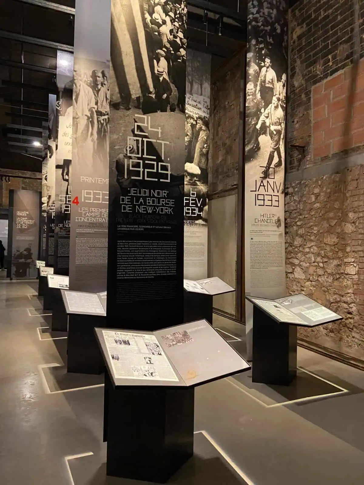 Banners and plaques telling the history of WWII inside Camp des Milles