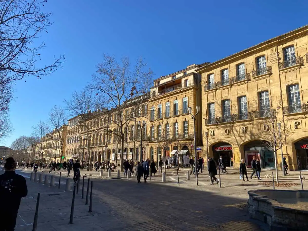 Street with low rise buildings in the old town of Aix, Provence