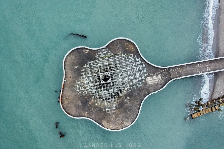 View of the Pier Sculpture from above, a modern artwork on a concrete platform over the Black Sea.