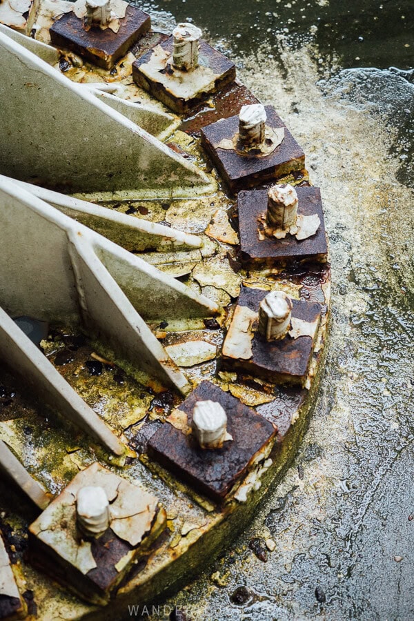 Rusted bolts at the base of the Pier Sculpture in Anaklia.