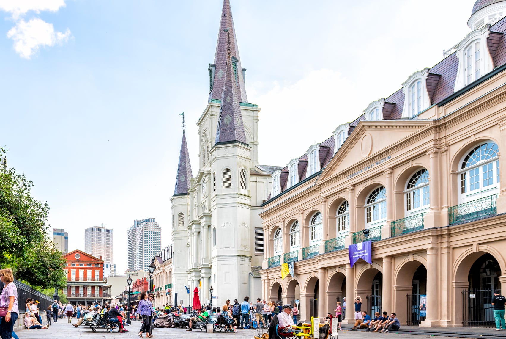 old town chartres street in louisiana famous city with many people crowd on jackson square and church