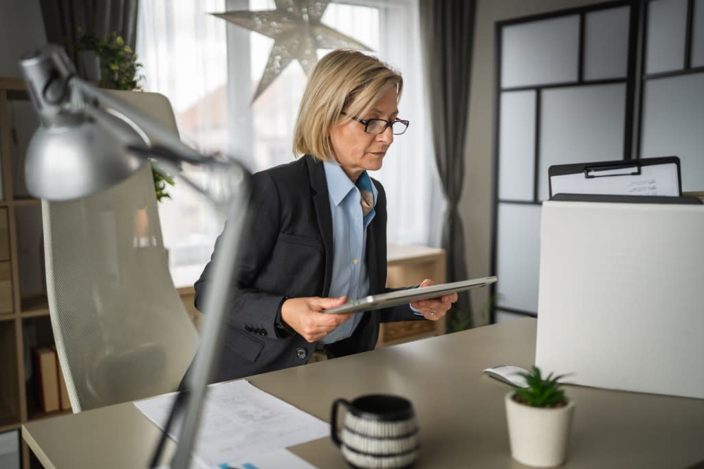 A business woman looking up Roth IRA rules for living abroad.