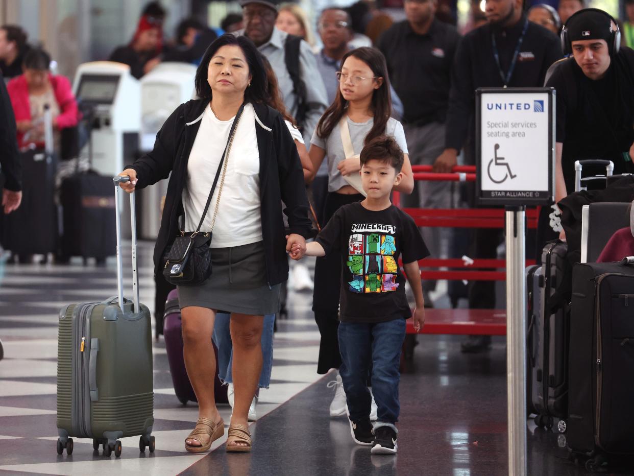 Travelers at Chicago's O'Hare International Airport for Labor Day weekend on September 01, 202.