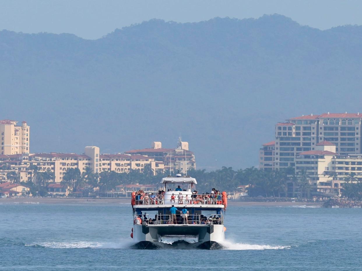 A boat with tourists cruises among the beaches of Puerto Vallarta, Jalisco, Mexico, on August 10, 2024.