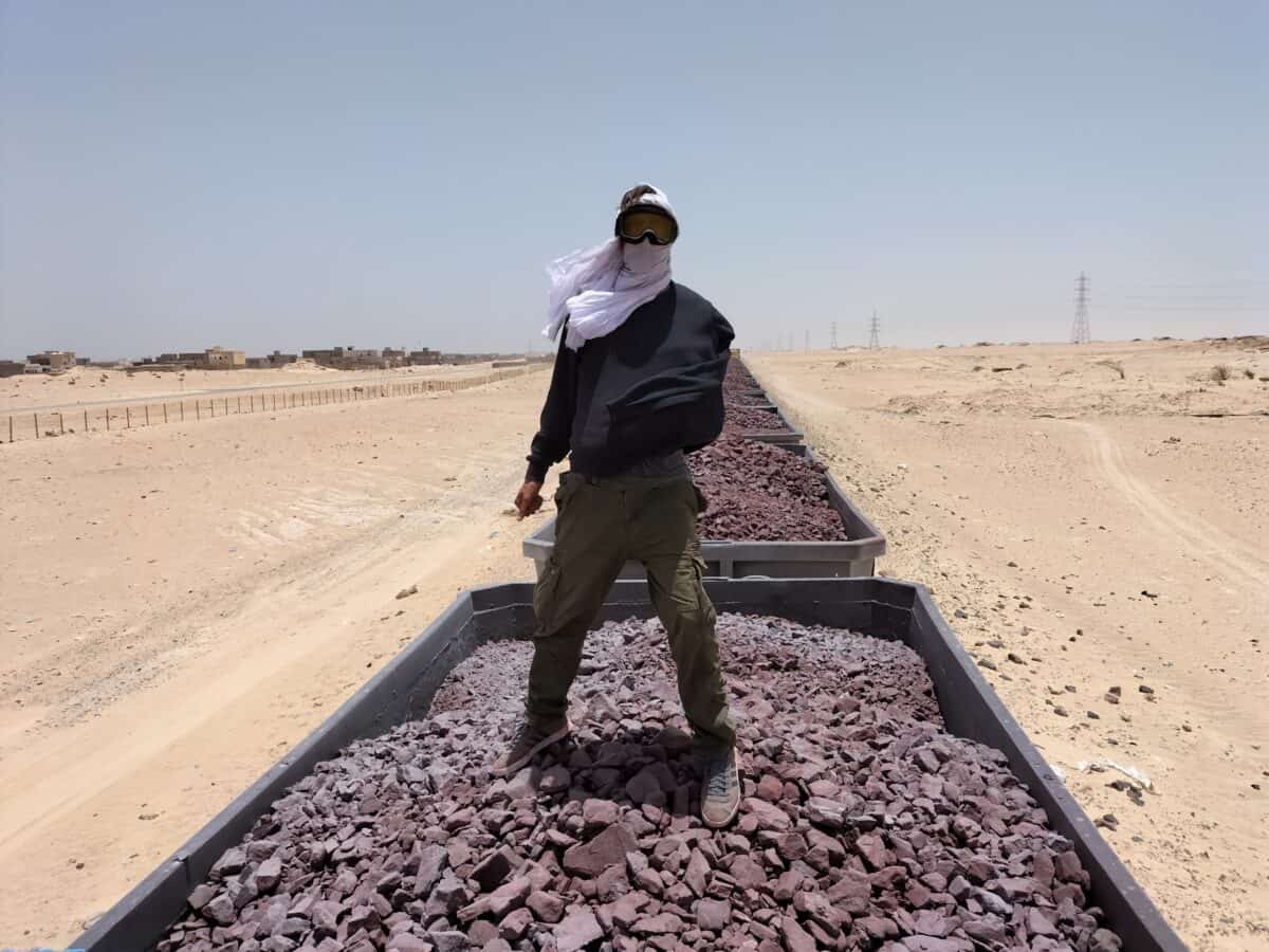 Jonny Blair riding the iron ore train in Mauritania