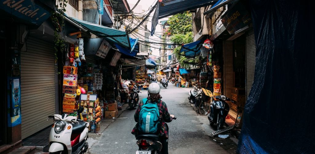 scooter riding through Vietnam streets