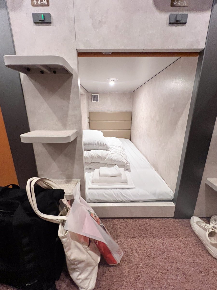 A single bed at a female-only capsule hotel in Osaka, Japan.