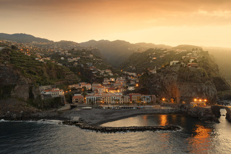 Oceanfront view of Madeira, Portugal at sunset.