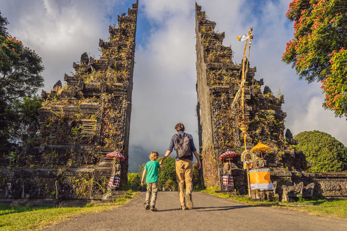 Father and Son Stand by Handara Gate in Bali.jpg