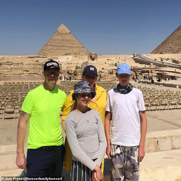 David and Laura with Tegan and Tyler pictured on their travels to Egypt - after leaving the UK behind