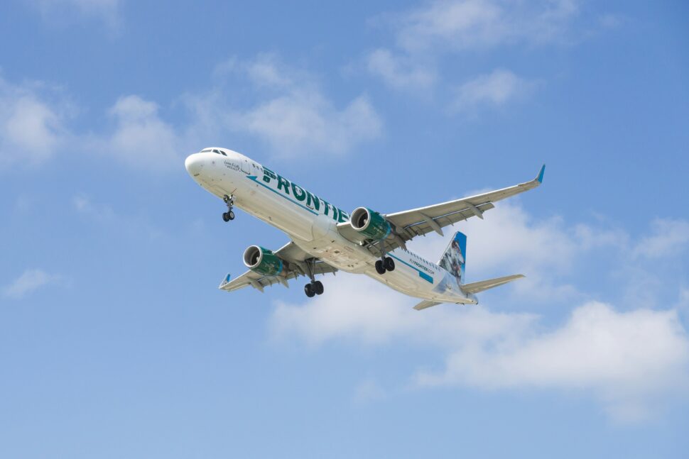 Frontier plane in flight 