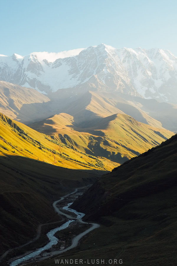 Sunrise from a viewpoint in Ushguli, looking out towards the mountains and the river.