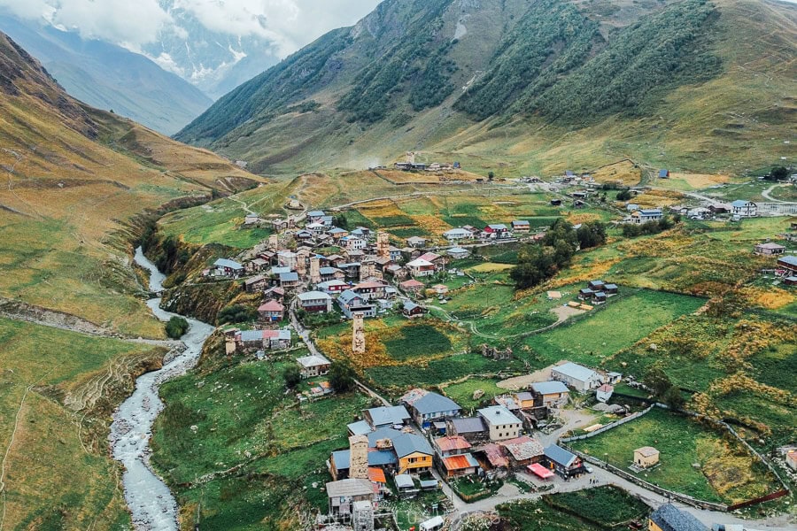 A bird's eye view of Ushguli villages and the Enguri River Valley photographed with a drone in autumn in Svaneti.