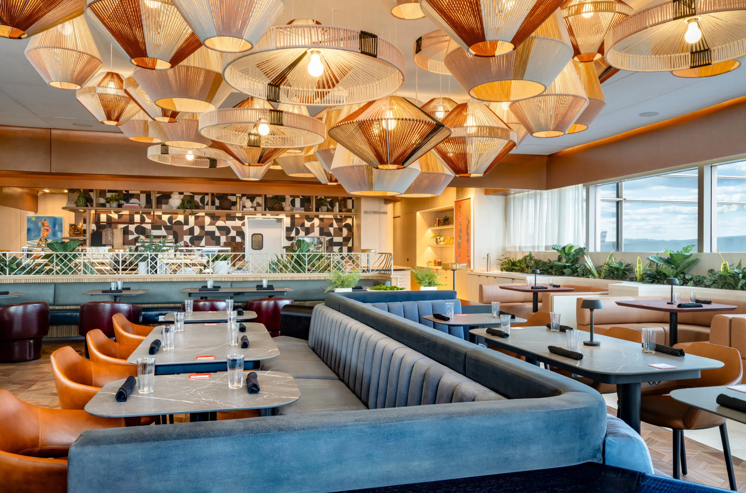 funky light fixture and booths at the capital one landing in D.C. 