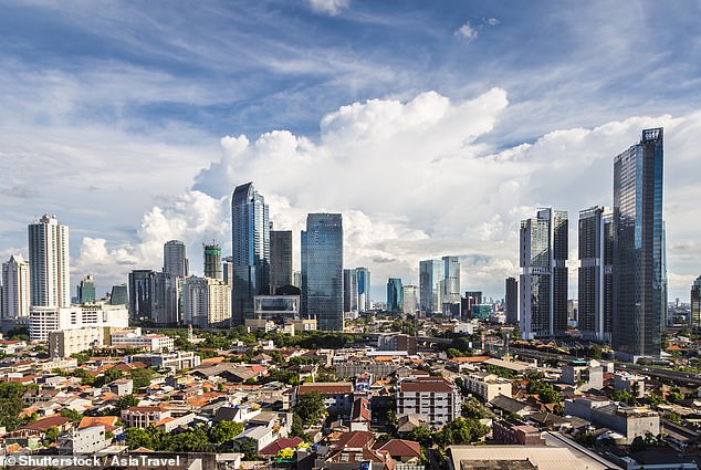 Indonesia places third on the list, with just under three-quarters of expats happy with their financial situation. Pictured is Jakarta