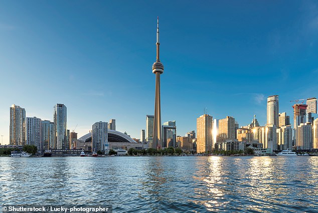 Canada is the world's least affordable country to be an expat, with one foreign resident describing the country as 'crazy expensive'. Pictured is Toronto