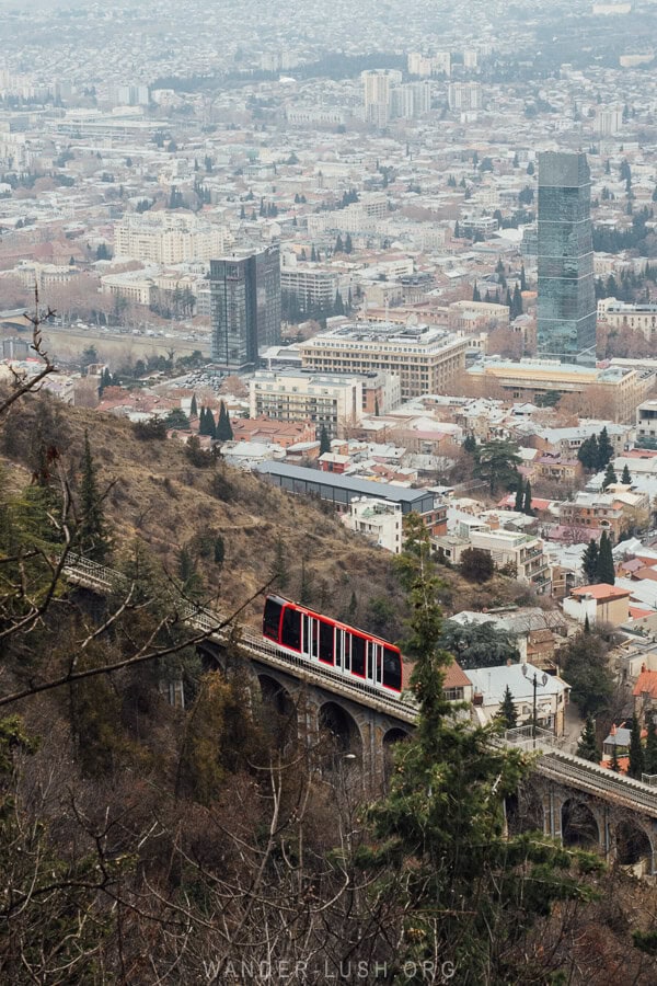 The Tbilisi Funicular moving up Mtatsminda Mountain overlooking the city.