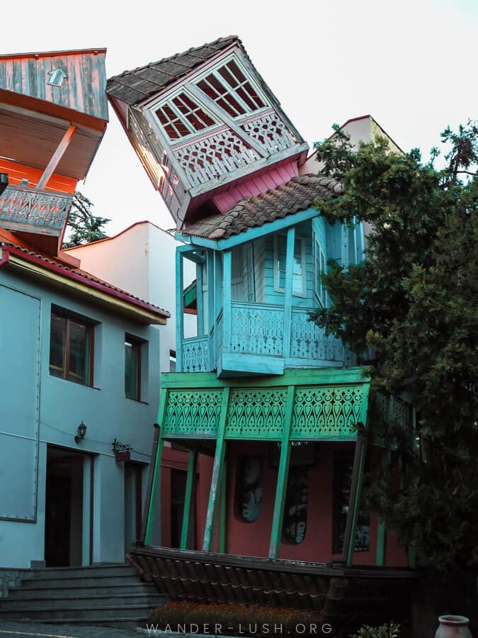 A sculpture in Mtatsminda Park depicting several houses with brightly coloured balconies.