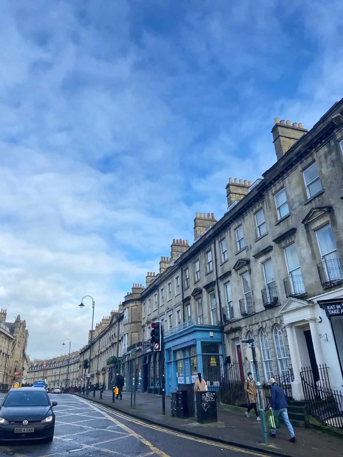 A typical street that you'd walk down on a Bath day trip featuring beautiful Georgian architecture