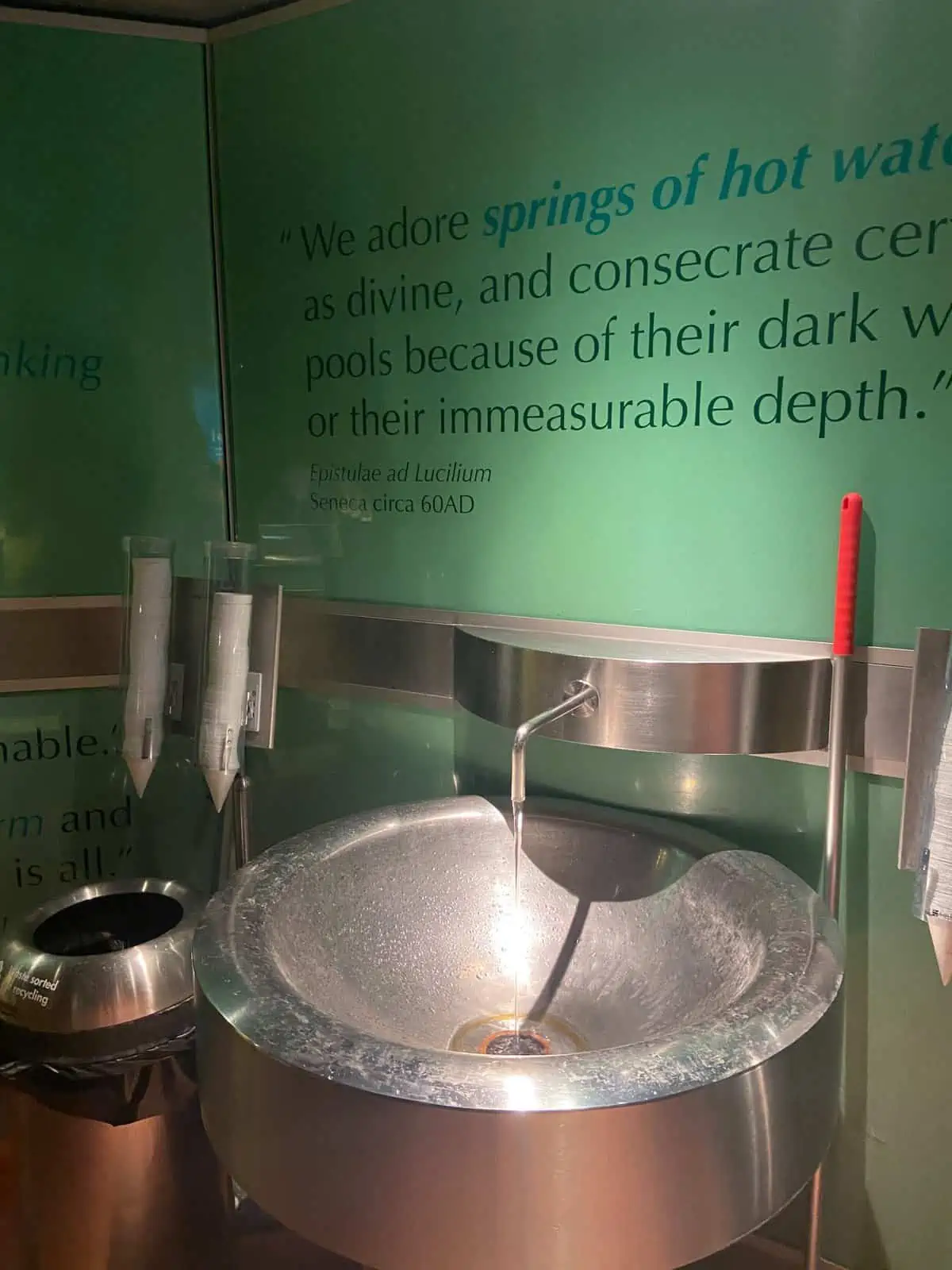 A sink and spout allowing you to drink the water at the Roman Baths in Bath