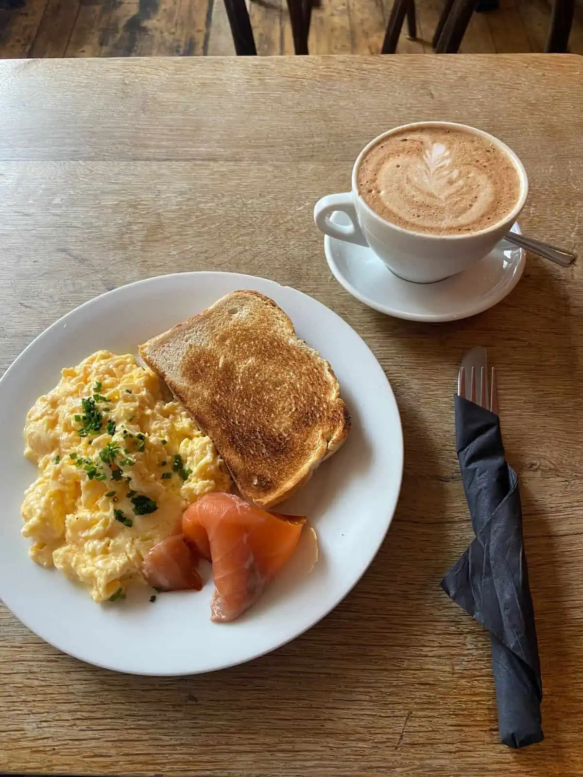 my breakfast of eggs, toast and smoked salmon at Same Same But Different in Bath