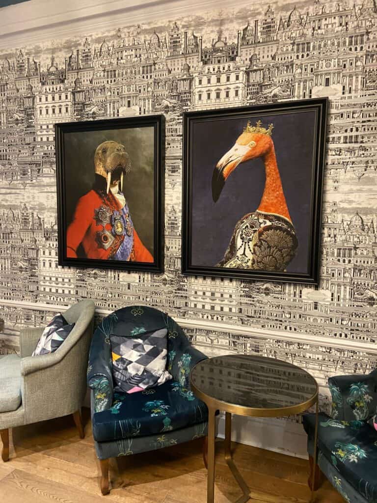 Hotel Indigo Bath lounge with paintings of a walrus and flamingo