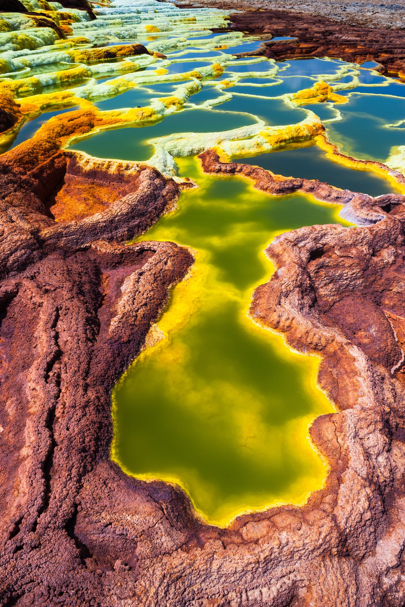 amazingly multicolored minerals create natural patterns on the dallol volcano, danakil depression, ethiopia