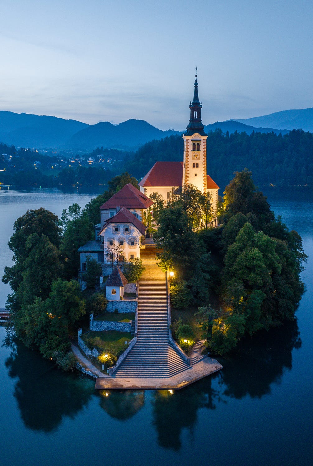 lake bled, slovenia, a picturesque mountain lake featuring the small pilgrimage church as slovenia most renowned lake, bled boasts the pilgrimage church of the assumption of mary