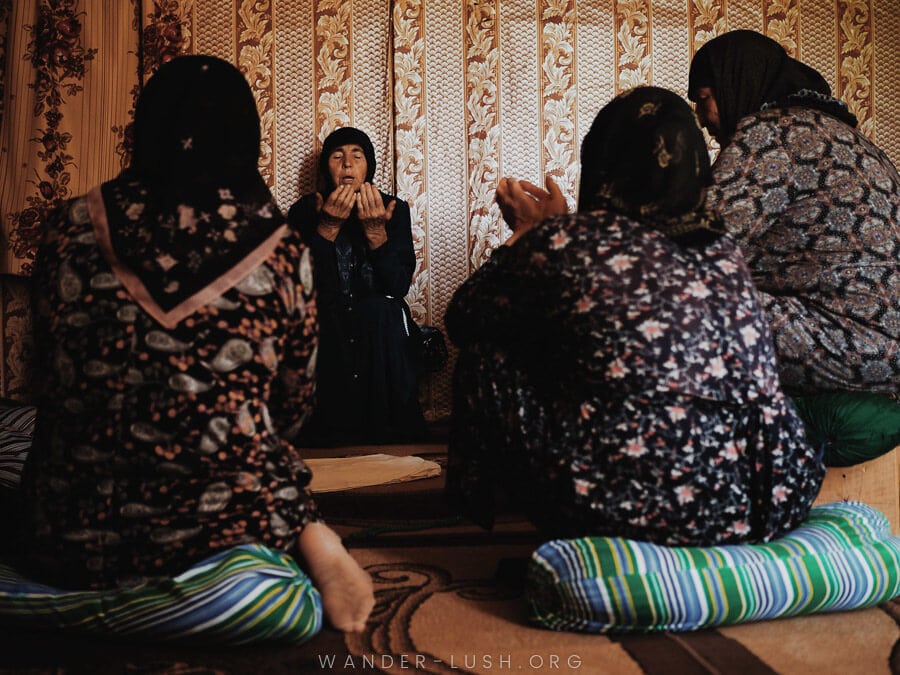 Kist women perform a traditional sufi ritual in a home in Georgia's Pankisi Valley.